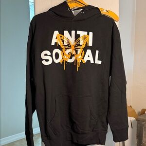 Fashion Nova Women’s Black Hoodie with Orange Butterfly Graphic